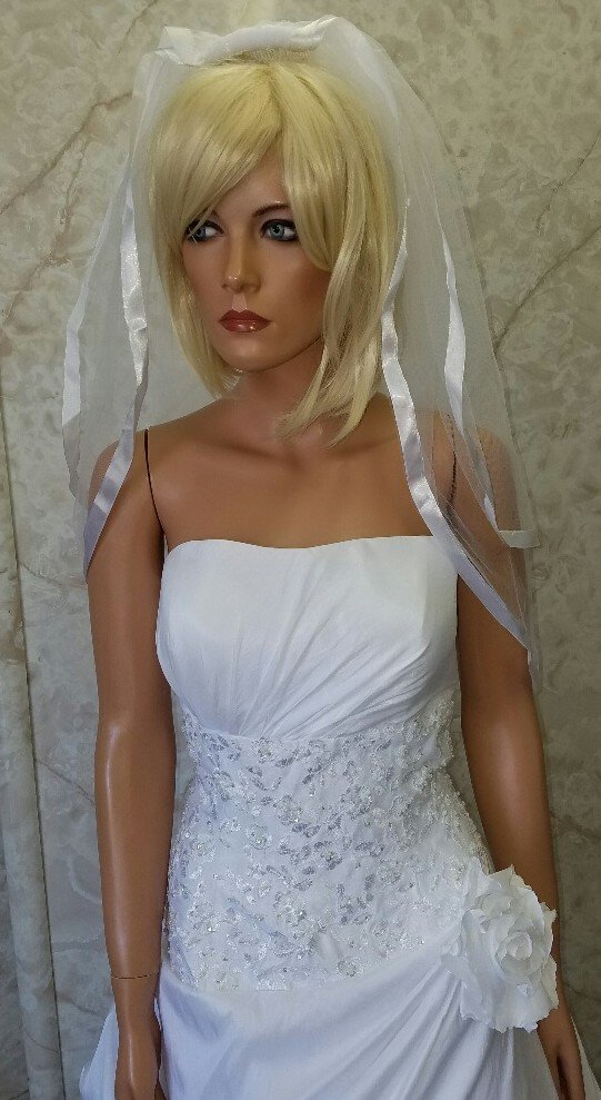 white taffeta wedding dress and veil